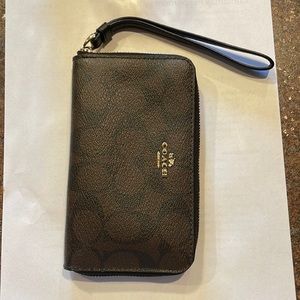 Coach Brown wallet/cell phone holder.